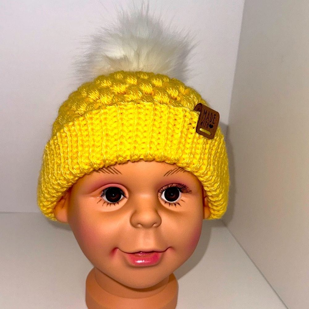 Beautiful yellow, crocheted, winter hat.